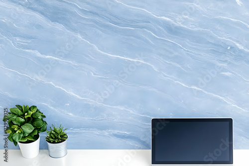 Laptop Sits on White Table ...