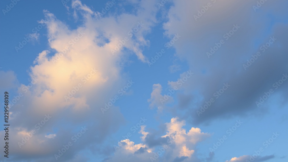 Serene Sunset Cloudscape Soft Hues of Blue and White in the Evening Sky Serene Sunset Cloudscape Soft Hues of Blue and White in the Evening Sky
