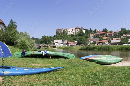 Zuzemberk with river Krka and castle in Slovenia photo