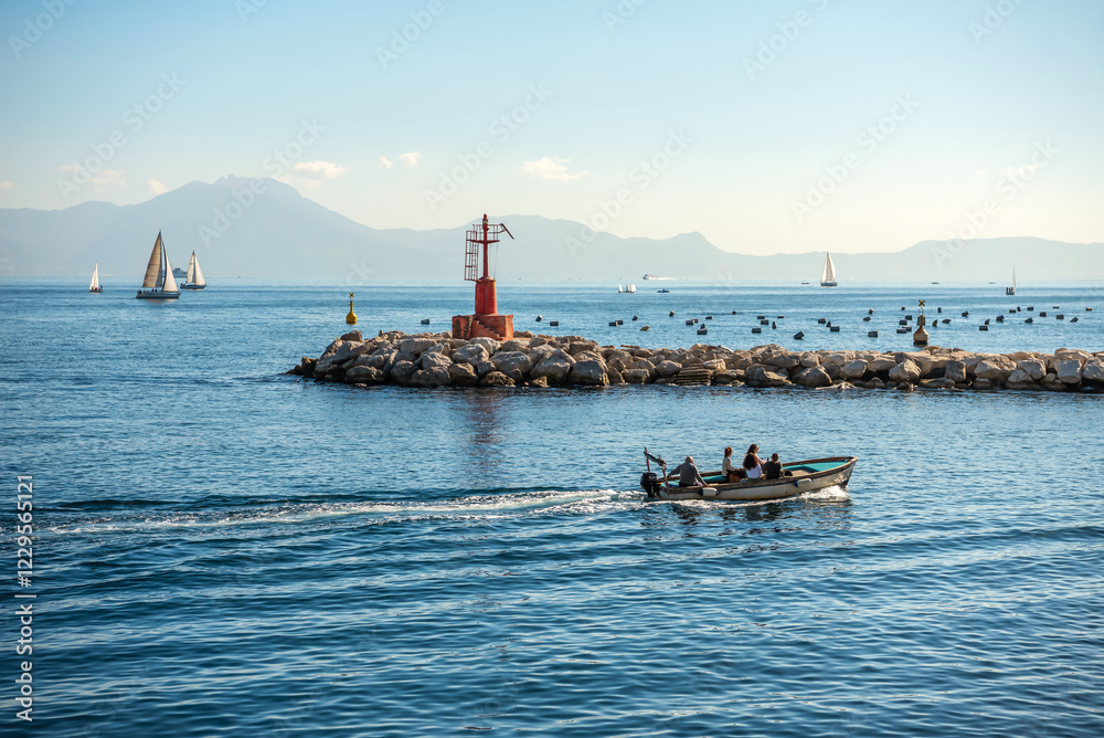 Gulf of Naples. Motorboat and sailing yachts in the waters of the Gulf of Naples