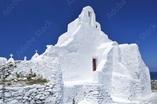 White church, Panagia Paraportiani, chapel in the city of Mykonos, Cyclades, Greece, Europe photo