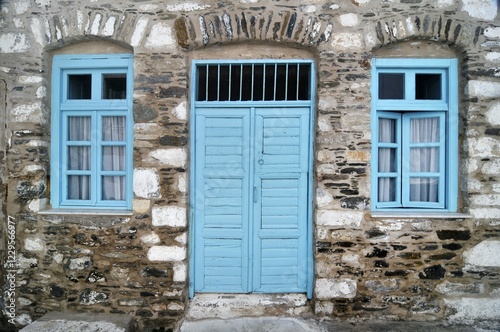 Doorway and windows of an old stone house, Cyclades, Greece, Europe