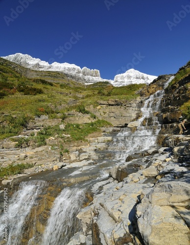 Waterfall at Logan Pass, main attraction of Glacier National Park, Montana, USA, North America photo