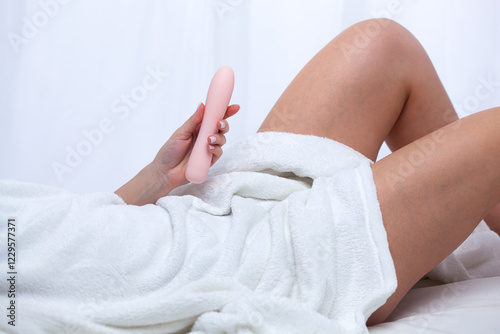 Konstfotografi The girl is lying in a white bed