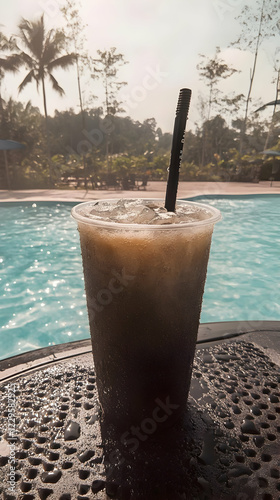 Iced Coffee Sits Poolside o...