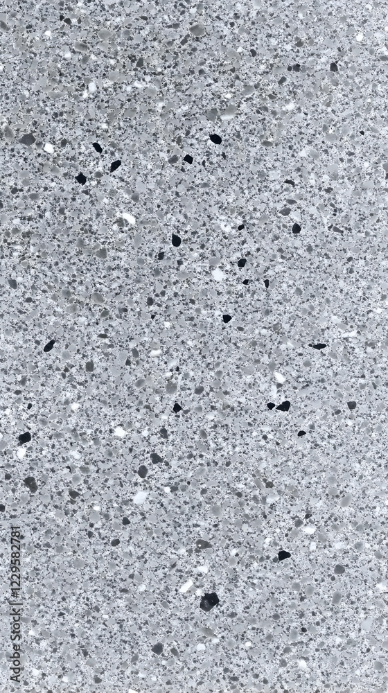 Close-up View of a Gray Speckled Surface with Small Black and White Inclusions Texture Background. Close-up View of a Gray Speckled Surface with Small Black and White Inclusions Texture Background.