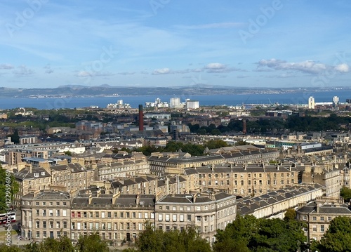 A high angle view view from Calton Hill looking towards the Firth of Forth across the city of Edinburgh, Scotland, UK. 
