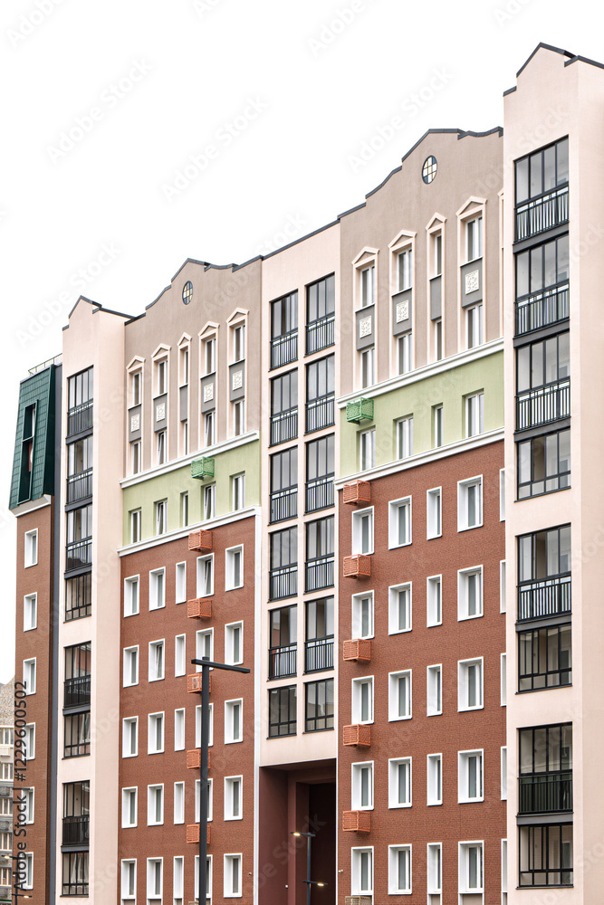 Fototapeta premium Multi-story residential building with colorful architecture, featuring geometric patterns, urban housing concept