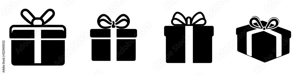 Gift boxes in various designs arranged in a row with bows on top set against a plain background Gift boxes in various designs arranged in a row with bows on top set against a plain background