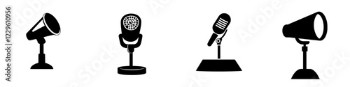 Various types of microphones and speakers on display for audio presentations at an event