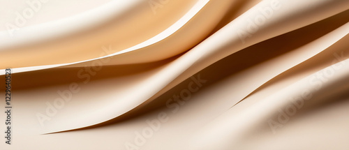 Sanfte Wellen eines beige-farbenen Stoffes auf einem neutralen Hintergrund

