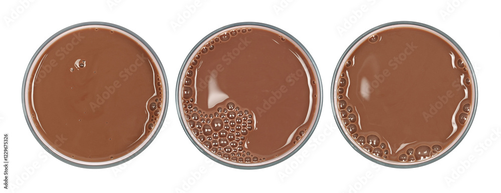 Fototapeta premium Set chocolate milk in glass isolated on white, top view 
