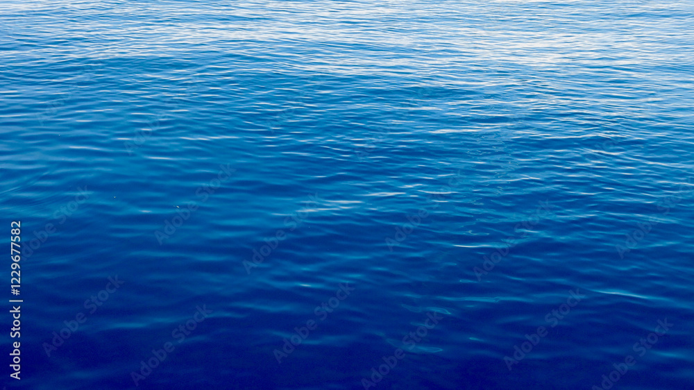 Fototapeta premium Calm sea. Top view of calm water surface. Sea surface background. Ocean texture.