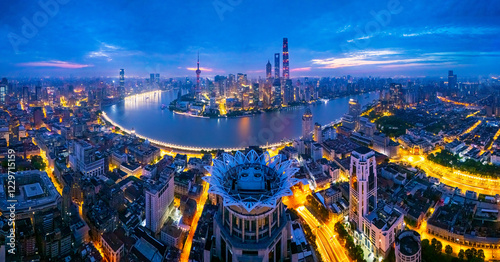 aerial view of bright shanghai skyline and winding river