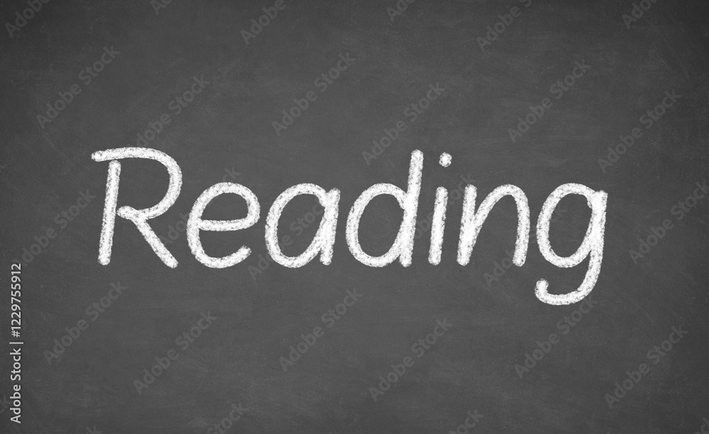 Reading lesson on blackboard or chalkboard. written in white chalk Reading lesson on blackboard or chalkboard. written in white chalk
