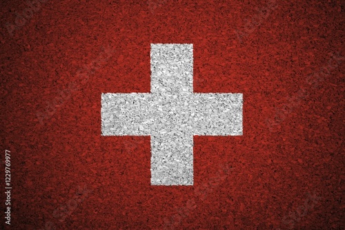 Fotografie The Swiss flag painted on a cork board