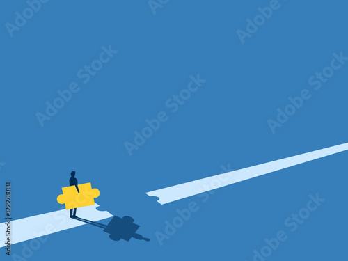 Solve the crisis, Businessman puts the missing pieces of the puzzle on the road