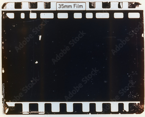 old film strip, underexposed 35mm film material on white. 