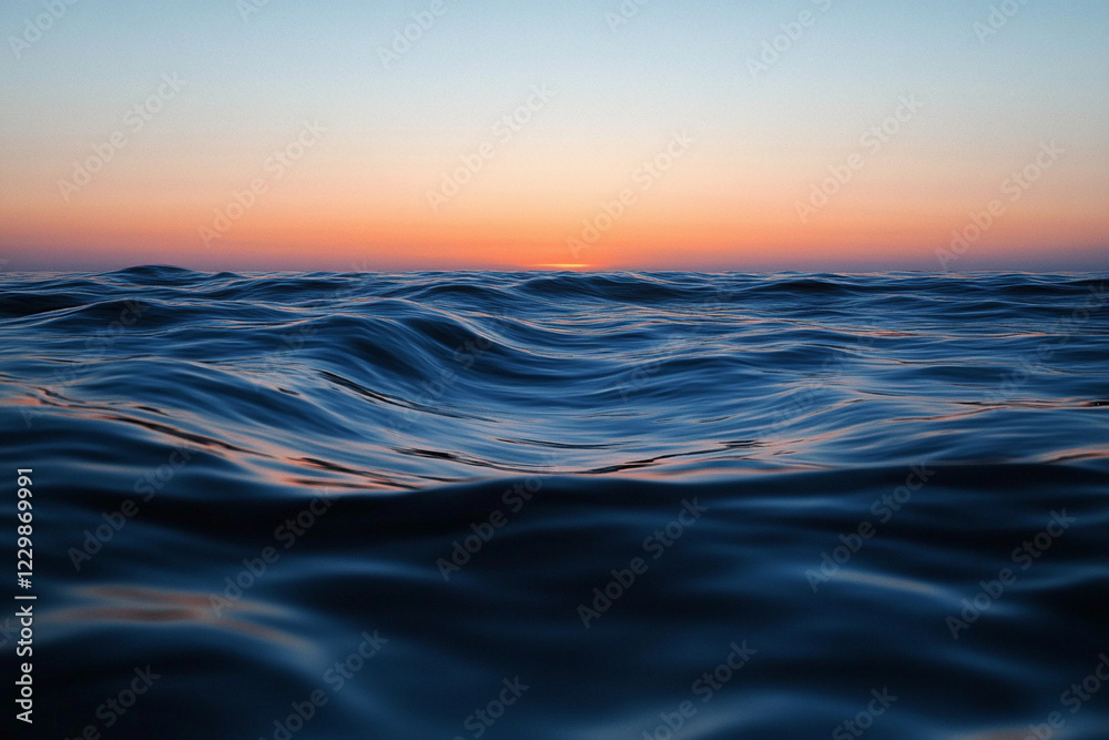 Sunset over calm ocean waters creates a serene atmosphere with vibrant colors on the horizon Sunset over calm ocean waters creates a serene atmosphere with vibrant colors on the horizon