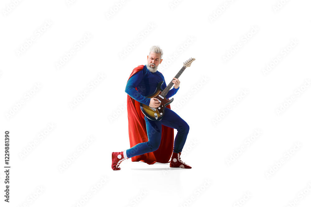 Grey-haired young man in superhero costume playing electric guitar, looking like a Rockstar against white studio background. Concept of music, hobby, performance, art. Copy space for ad Grey-haired young man in superhero costume playing electric guitar, looking like a Rockstar against white studio background. Concept of music, hobby, performance, art. Copy space for ad