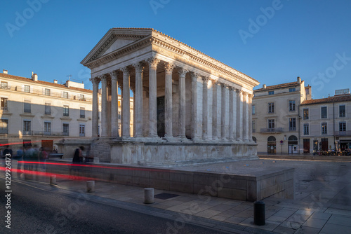 Maison Carree - restored roman temple dedicated to 'princes of youth', with richly decorated columns & friezes in Nimes, France