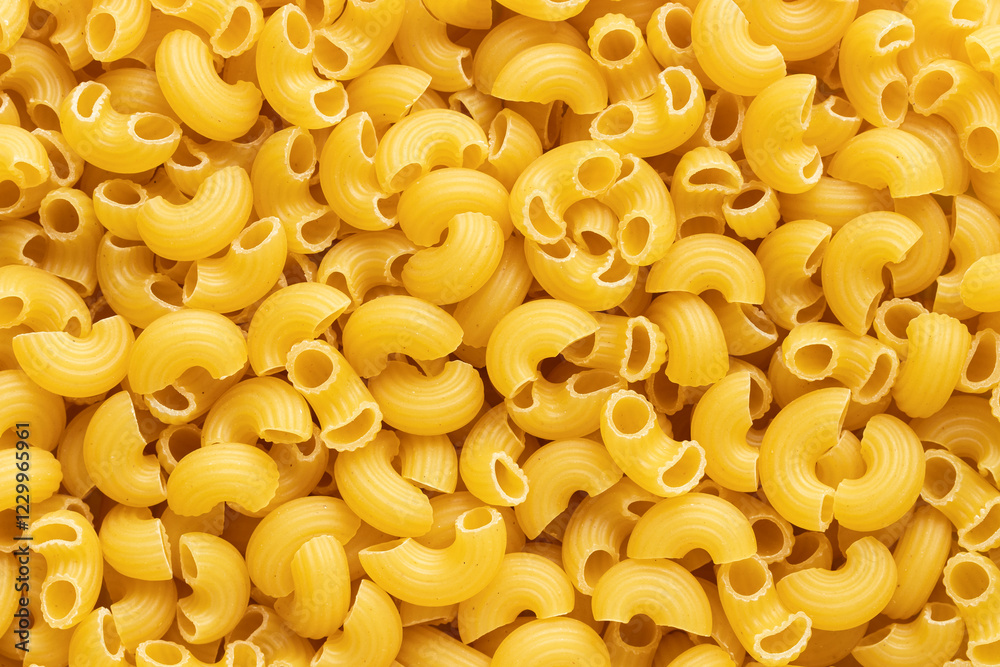Top view of raw macaroni background Top view of raw macaroni background