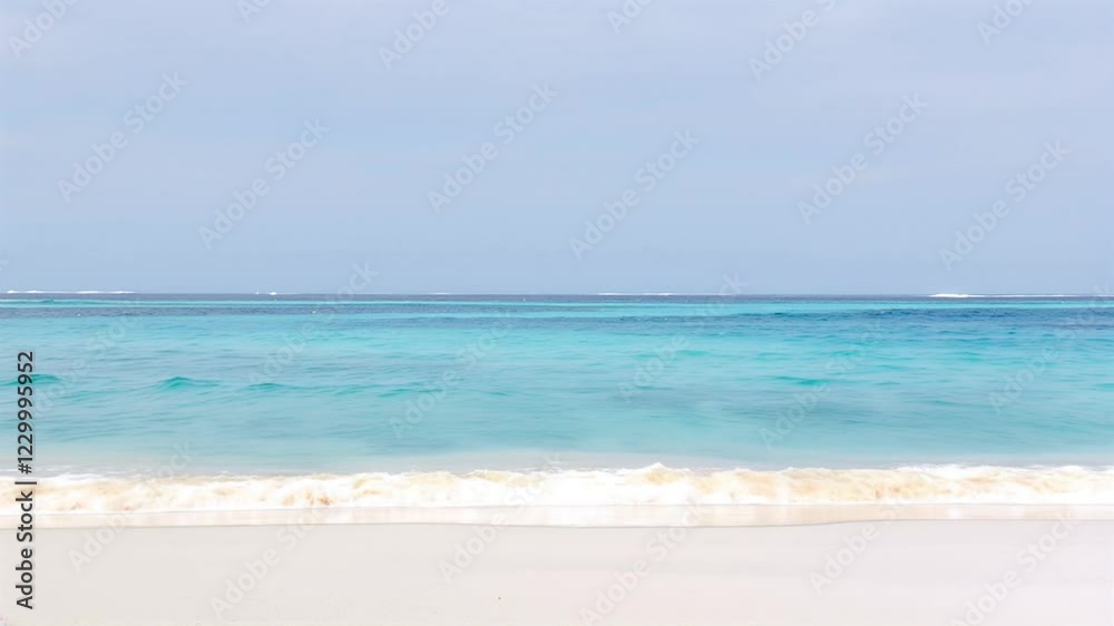 Turquoise ocean waves lapping white sand beach, calm sky Turquoise ocean waves lapping white sand beach, calm sky