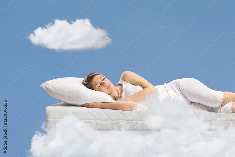 © Ljupco Smokovski - Young woman sleeping on a floating mattress