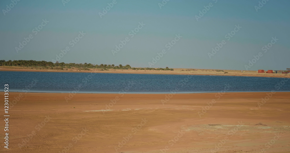 Golden sand close up Sahara desert landscape with lake. Golden sand close up Sahara desert landscape with lake.