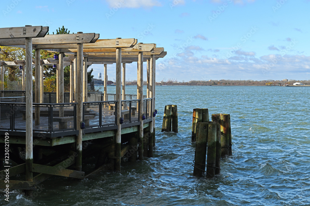 One of Battery Park City’s most popular destinations, South Cove Park with winding walkways, quay, curved jetty. New York City One of Battery Park City’s most popular destinations, South Cove Park with winding walkways, quay, curved jetty. New York City