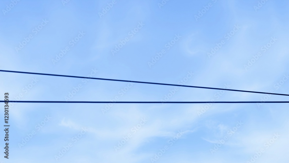 Two Parallel Wires Against a Clear Blue Sky Two Parallel Wires Against a Clear Blue Sky