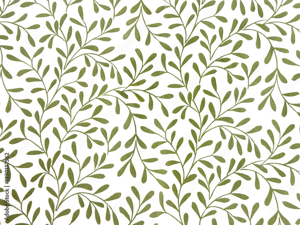 Fabric with green leaves and branches pattern on white background. Seamless background texture. Fabric with green leaves and branches pattern on white background. Seamless background texture.