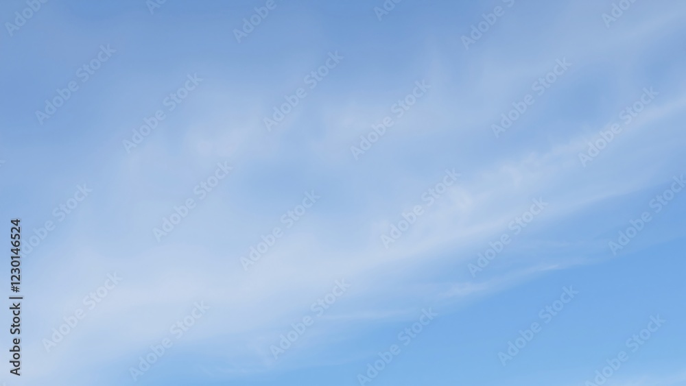 Serene Blue Sky with Wispy Cirrus Clouds - Natural Background Texture Serene Blue Sky with Wispy Cirrus Clouds - Natural Background Texture