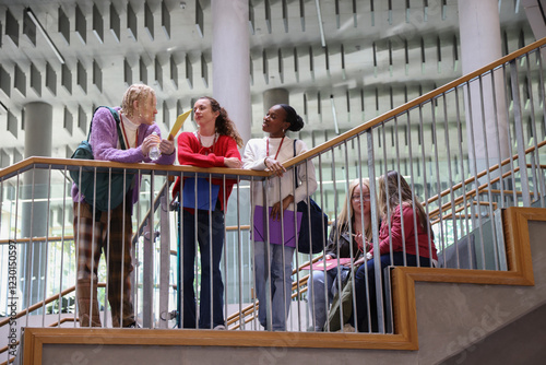 Disabled friends standing on stairs in community center photo