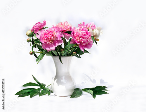 Wallpaper Mural Pink peonies in porcelain vase, green leaves on a light background with space for text Torontodigital.ca