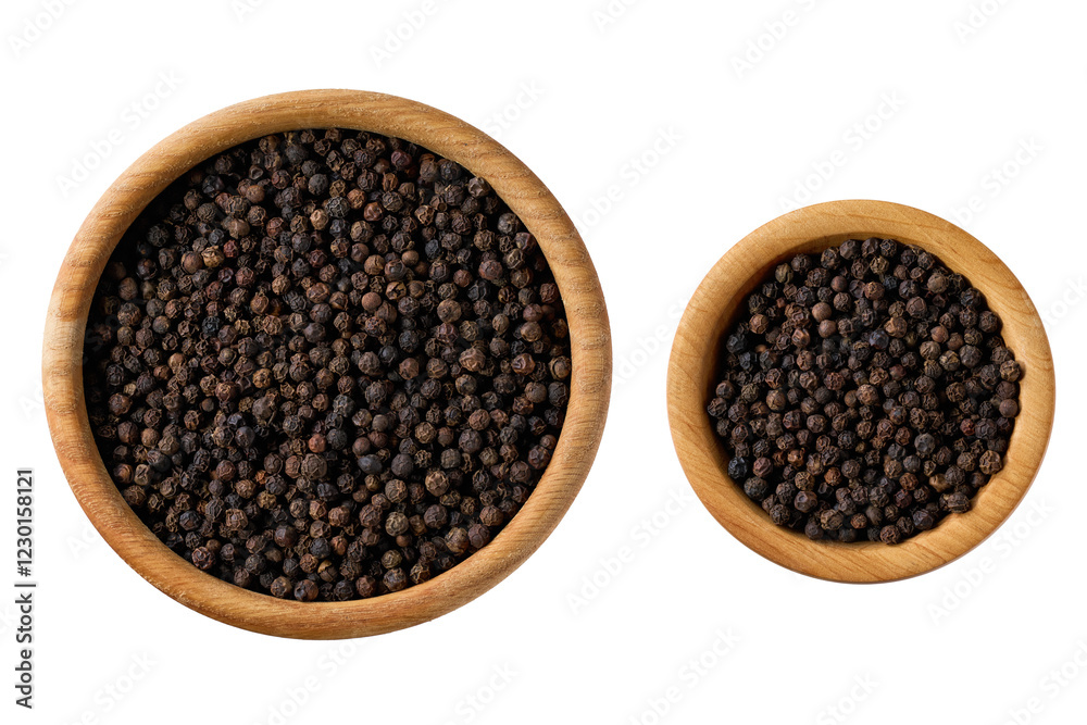 black pepper seeds in a wooden bowl isolated on white background, top view. black pepper seeds in a wooden bowl isolated on white background, top view.