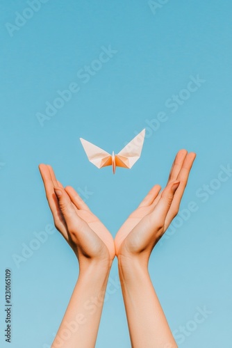 Minimalist Origami Art Cupped Hands Releasing Paper Bird Against Clear Sky - Innovative Visuals for Inspirational Marketing and Creative Industries
