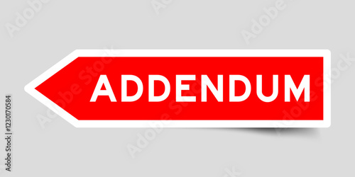 Red color arrow shape sticker label with word addendum on gray background