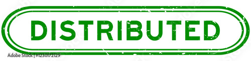 Grunge green distributed word rubber seal stamp on white background