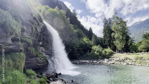 Refreshing Summer Waterfall in Faido, Switzerland photo