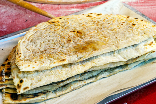 Traditional azerbaijani cuisine flat bread with herbs and meat. Azerbaijan national cuisine kutab or qutab