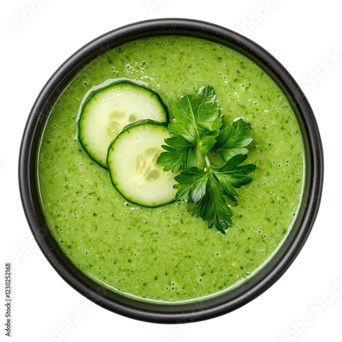 Fresh cucumber gazpacho in black bowl garnished with cucumber slices and parsley