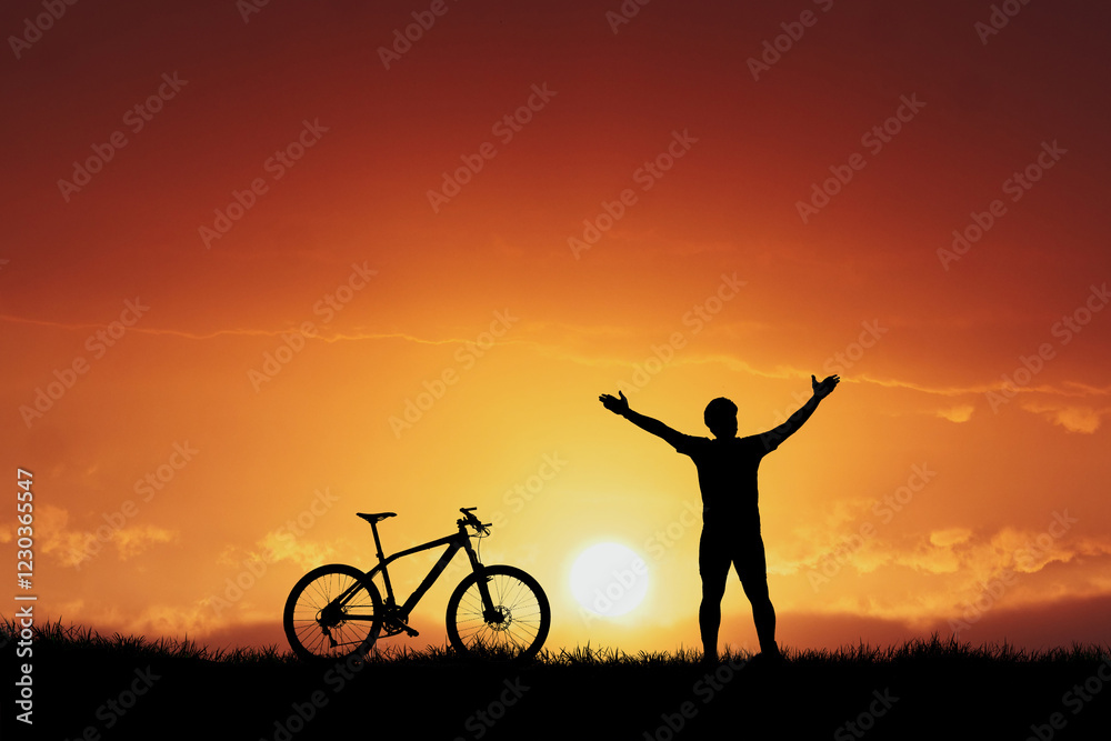 Sunset Victory: A silhouette of a cyclist stands with arms outstretched, a mountain bike at their side, against the backdrop of a vibrant sunset. Sunset Victory: A silhouette of a cyclist stands with arms outstretched, a mountain bike at their side, against the backdrop of a vibrant sunset.
