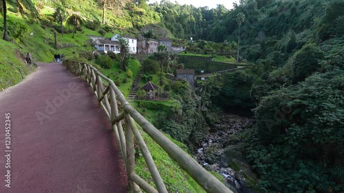 Ribeira dos Caldeiroes Natural Park, waterfalls, green lush, nature and hiking trails on the island of the Azores. photo