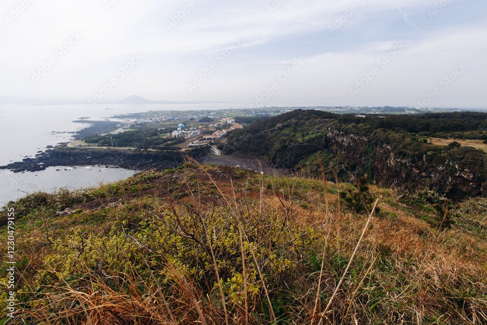 Obraz premium Udo Island, Jeju Island province, South Korea, Jeju-do, panoramic aerial view of coastline sea landscape in a sunny day, U-do Island, Soseom cow island, Jeju-si