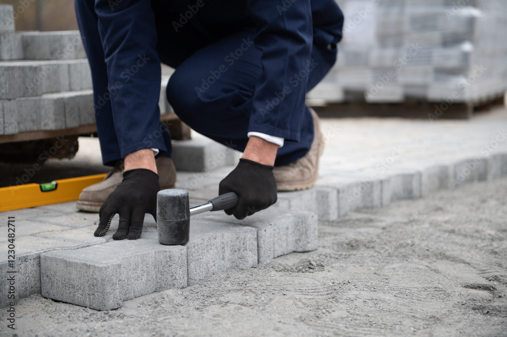 Pavement. Laying paving stones. Cube, openwork plate Pavement. Laying paving stones. Cube, openwork plate