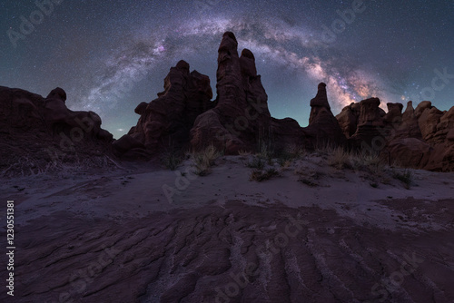 Starry Nightscape Over Sandstone Formations in Goblin Valley photo