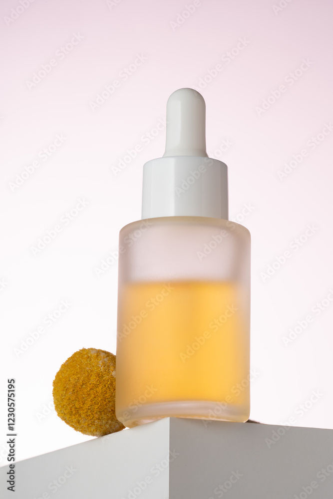 © ADDICTIVE STOCK - Cosmetic serum bottle with dropper on minimalist podium © ADDICTIVE STOCK - Cosmetic serum bottle with dropper on minimalist podium