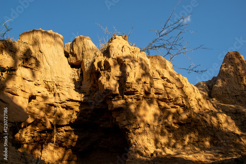 the Tatacoa Desert in Colombia, Huila, showcasing its arid landscape, eroded canyons, unique rock formations, and vibrant skies. Perfect for nature, travel, and adventure themes. photo