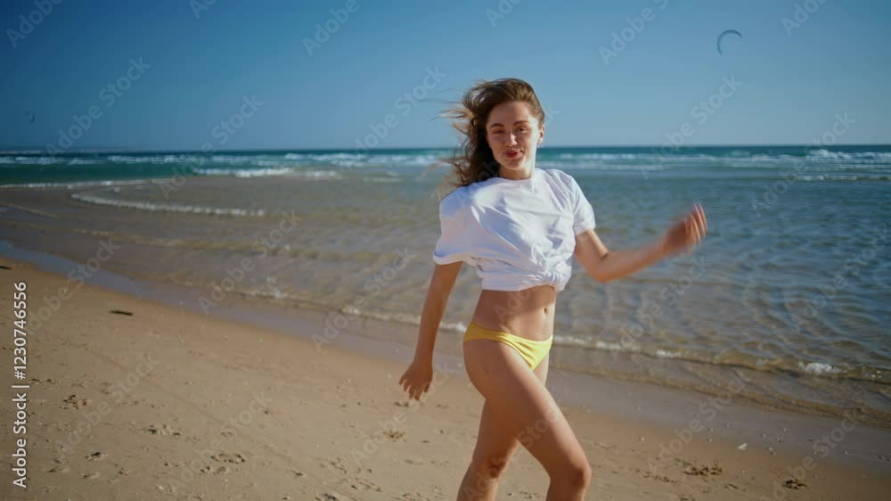 Vacation model enjoy breeze on summer beach closeup. Smiling woman posing camera Vacation model enjoy breeze on summer beach closeup. Smiling woman posing camera